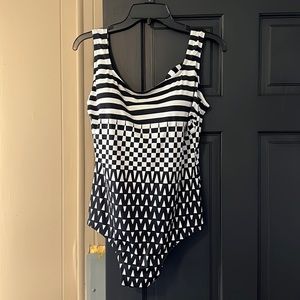 Gently used one piece swimsuit. Sewn in padding